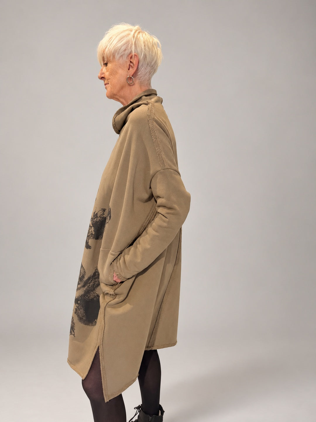 Kedziorek taupe floral print cotton dress, side view showing raised collar and pocket