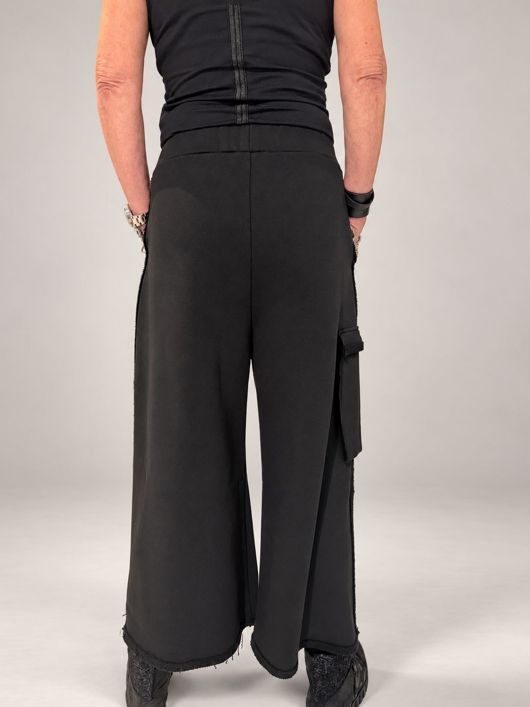 Kedziorek black wide-leg cotton cargo trousers, back view showing cropped hems