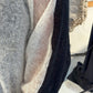 La Vaca Loca Intenso black and off-white knitted top, angled view