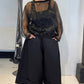 La Vaca Loca Marmoreo top showing sculptural neckline