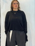 La Vaca Loca Tierra knitted top showing sleeve texture