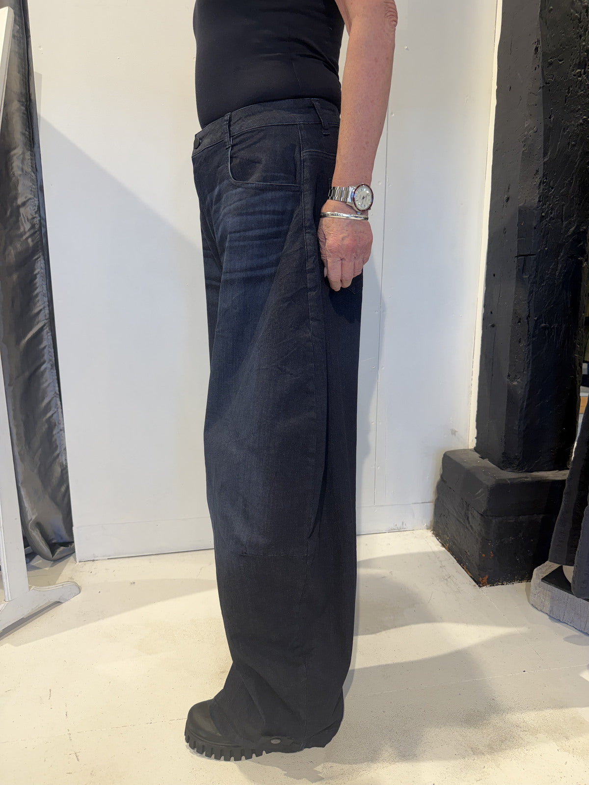 PLU Bubble denim trousers in dark blue, side view