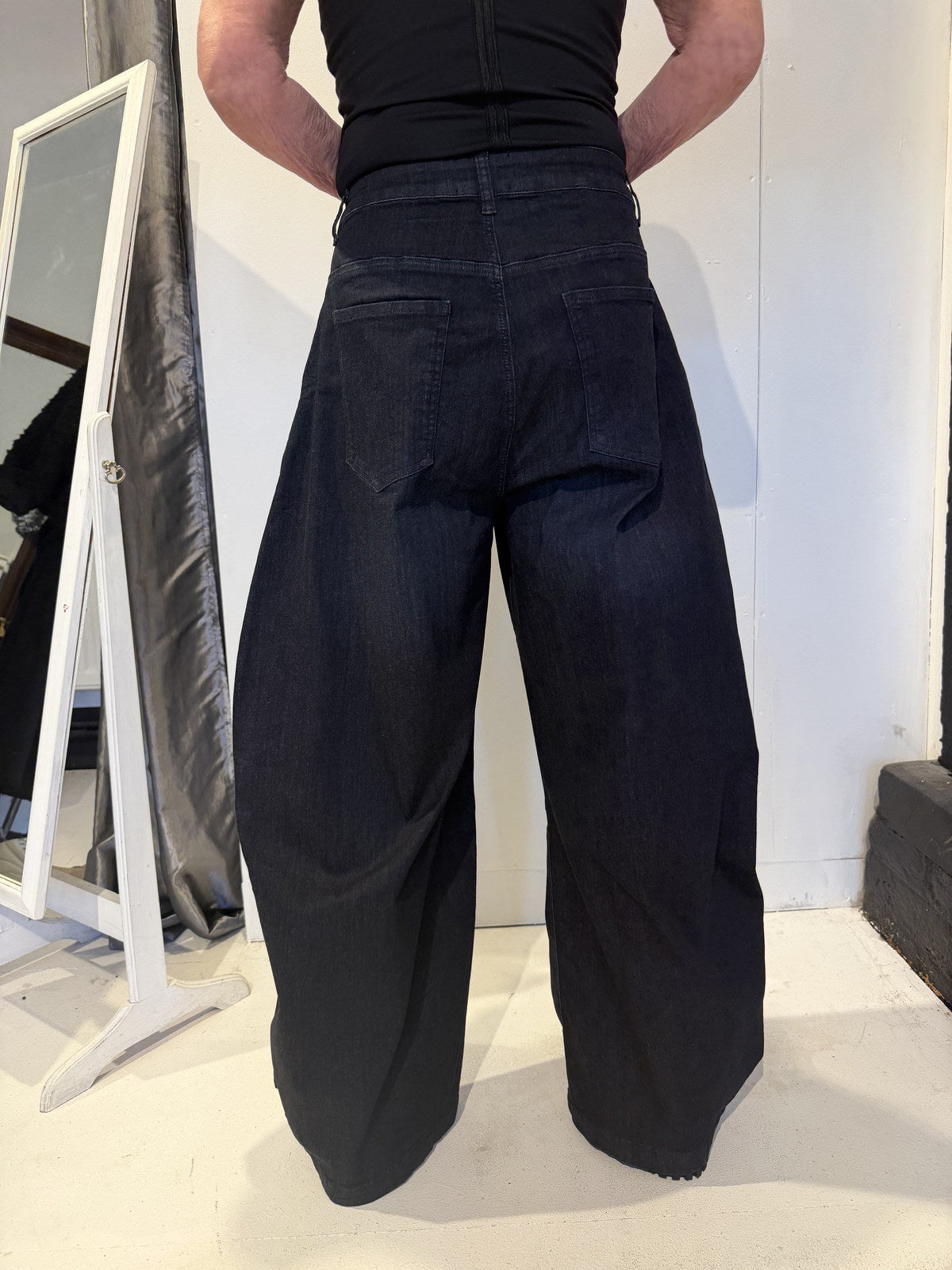 PLU Bubble denim trousers in dark blue, back view