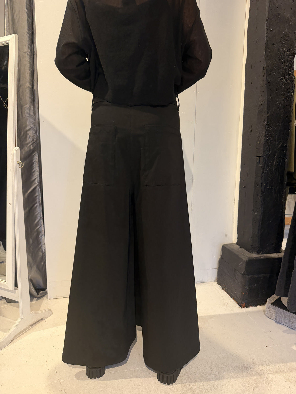PLU Split Skirt wide-leg trousers in black, back view