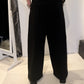 PLU Neo Balloon cotton-blend trousers in black, back view