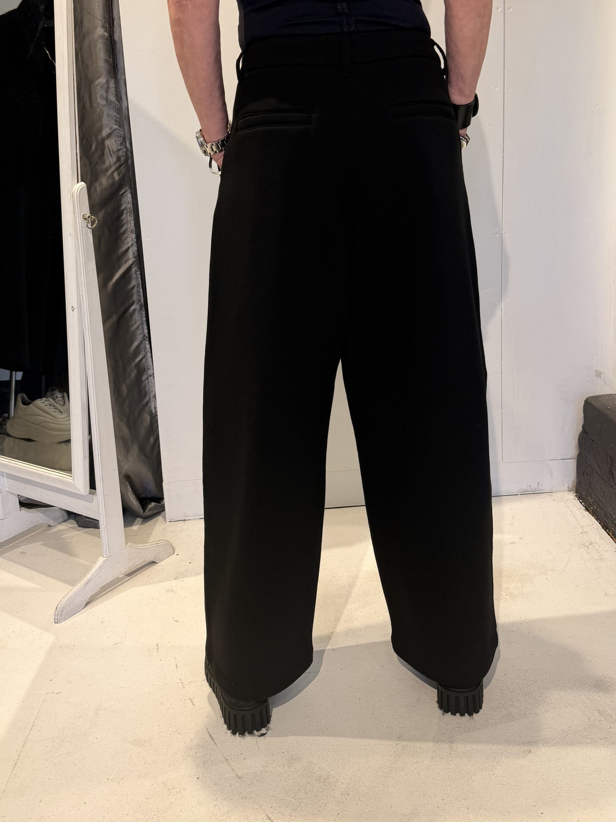 PLU Neo Balloon cotton-blend trousers in black, back view
