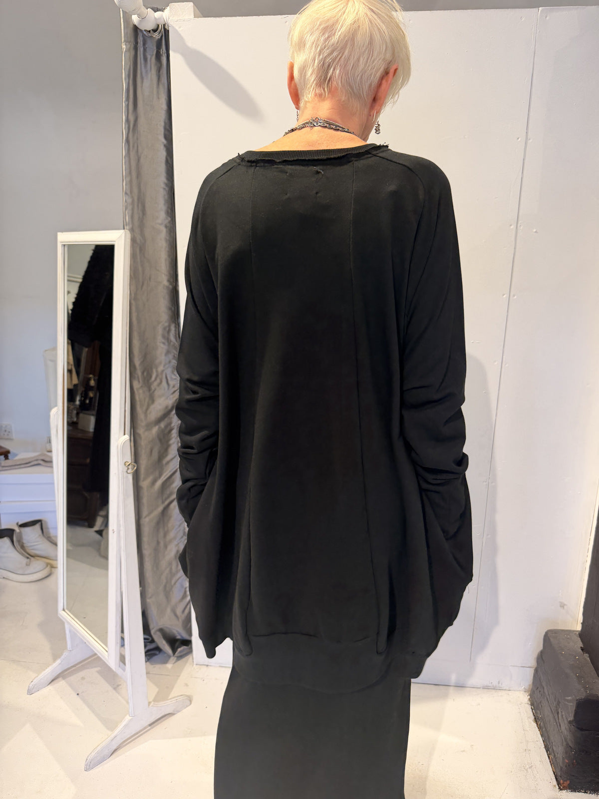PLU Long sweat tunic in black, back view