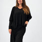 Transit black draped virgin-wool jumper – full-length styling view
