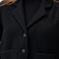 Transit black virgin-wool jacket – lapel and button detail
