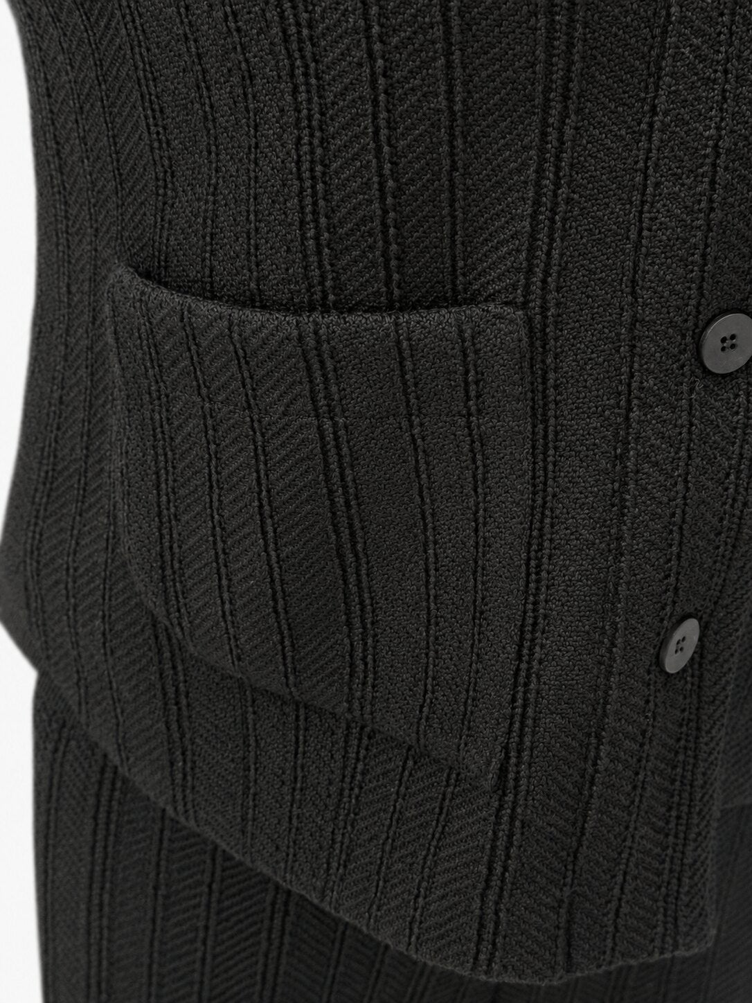 Transit black virgin-wool jacket – textured patch-pocket detail