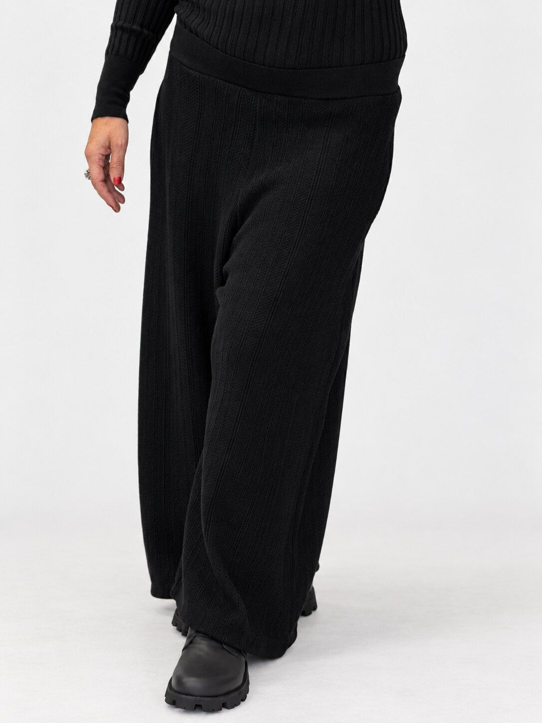 Transit black textured virgin-wool wide-leg trousers – front movement view