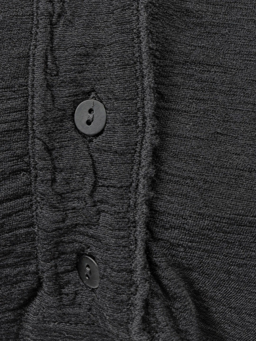 Transit black wool top – textured buttoned placket detail