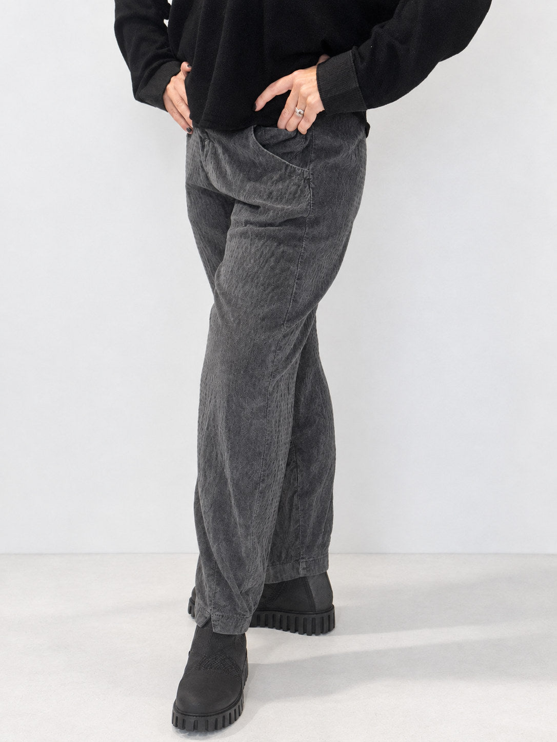 Transit grey textured tapered trousers – angled view