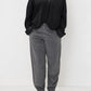 Transit grey textured tapered trousers styled with a black top