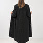 Transit black flecked long coat – open back view showing full silhouette